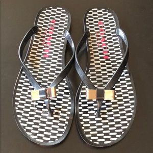 Coach sandals firm on price